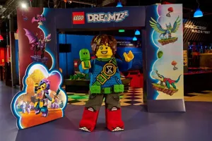 Family of 4 viewing LEGO Dreamzzz 4D cinema movie at LEGOLAND Discovery Center Arizona