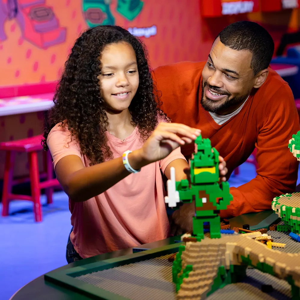Father and daughter building at LEGOLAND Discovery Center Bay Area