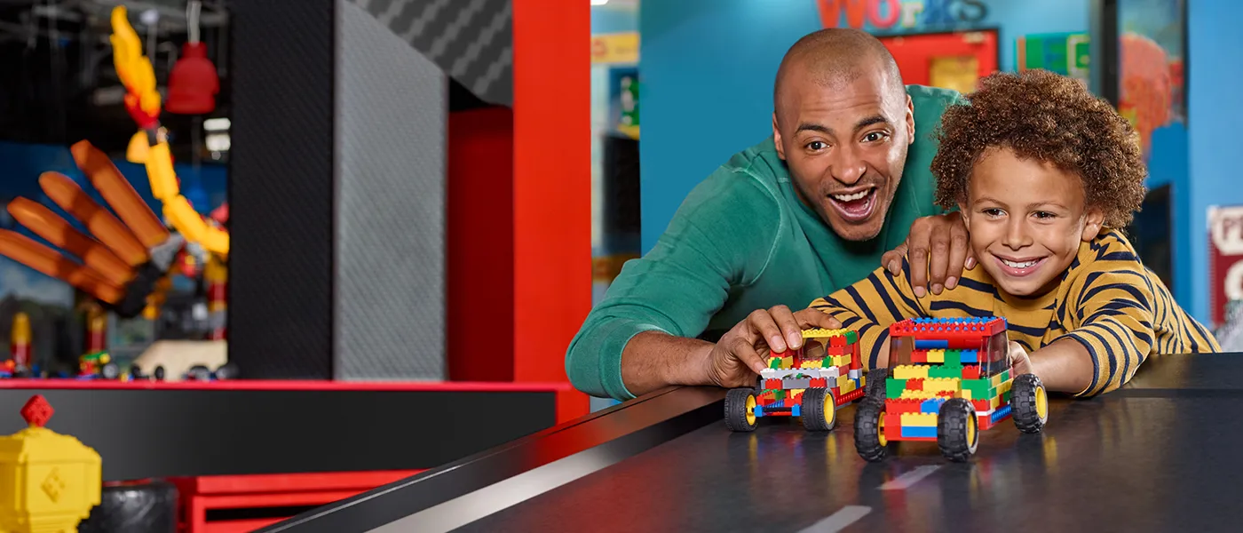 LEGOLAND Discovery Center's Endless Annual Pass Sale, featuring happy kids building with LEGO bricks and bright, playful graphics