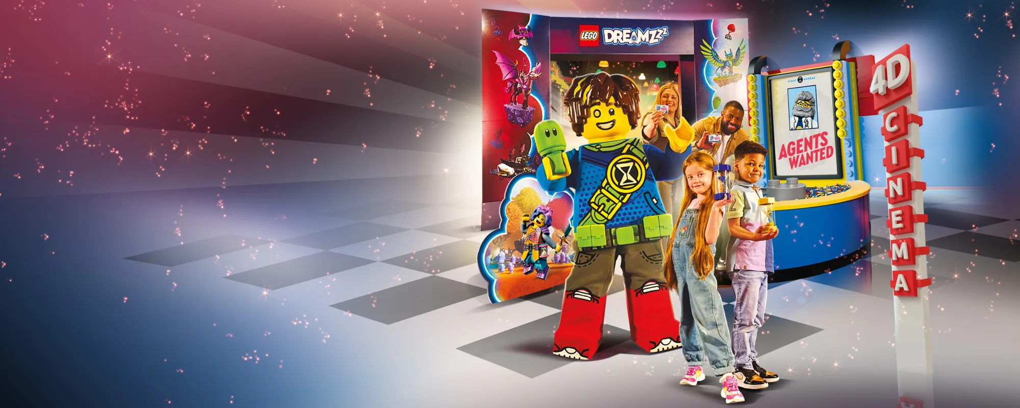 Dreamzzz banner with mascot Mateo, a couple of children holding LEGO builds, and a couple of parents showing passes behind them all in front of the LEGOLAND Discovery Center 4D theater